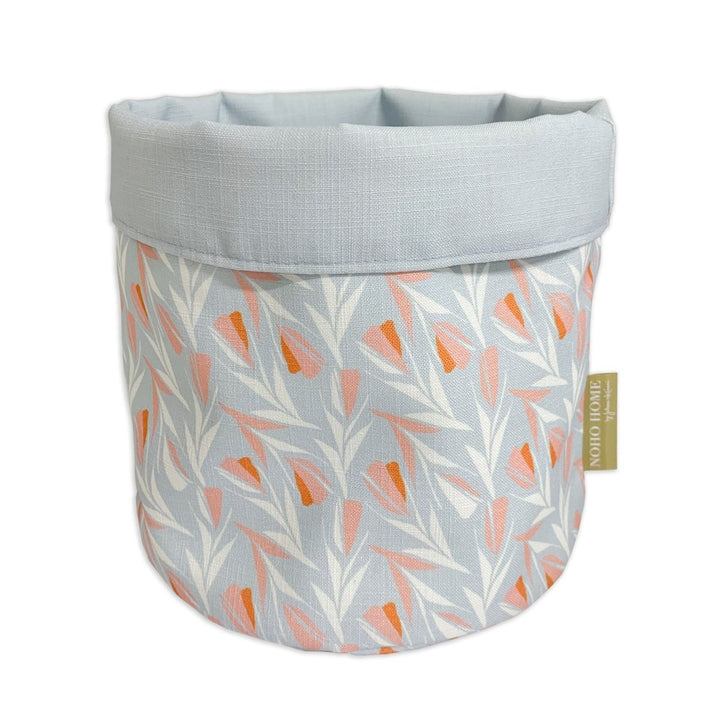 Sky Lokelani Fabric Planter - a vibrant, native Hawaiian design with pale blue and peach hues.