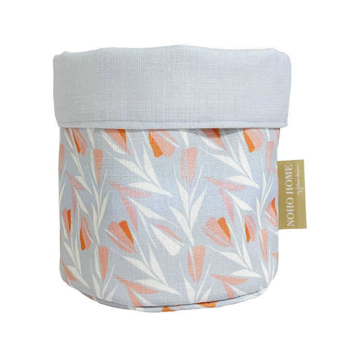 Sky Lokelani Fabric Planter - a vibrant, native Hawaiian design with pale blue and peach hues.