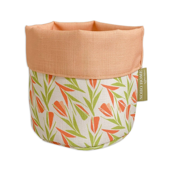 Citrus Lokelani Fabric Planter -  a vibrant, native Hawaiian design with soft peach and lively green hues.