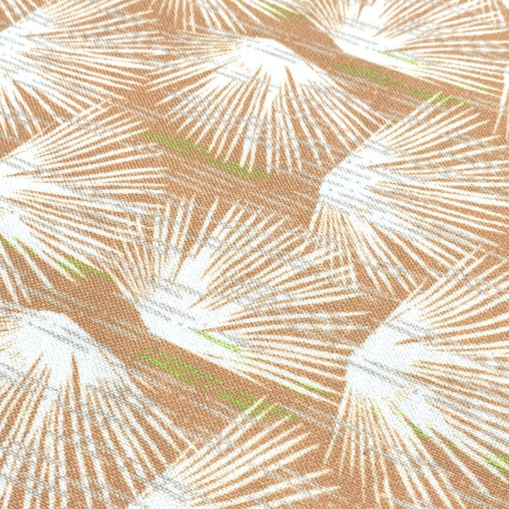 Closeup of Ivory and Orange Loulu Dining Napkin Set 