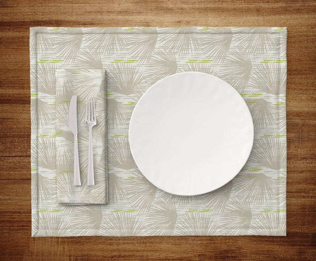 Table setting of plate, silverware, napkin and Beige and Ivory Loulu Dining Placemat Set