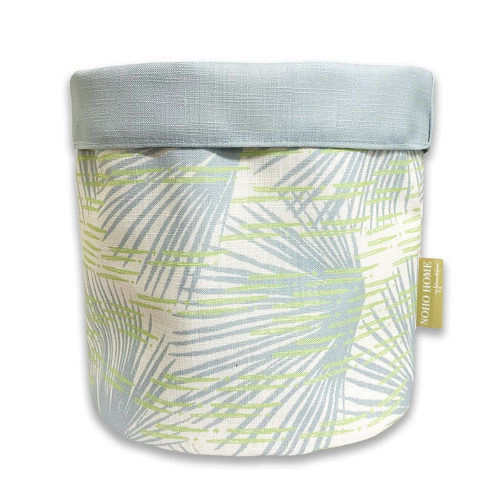 Celery and Light Blue Loulu Fabric Planter - Large A decorative planter with a palm leaf design, in light blue and celery accents.