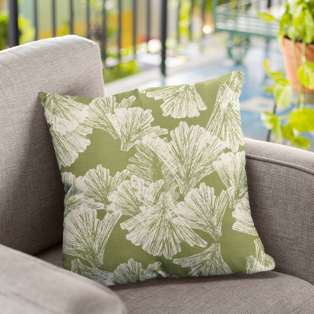 Aloe and Ivory Nahenahe Square Pillowcase Set On a Grey Fabric Chair