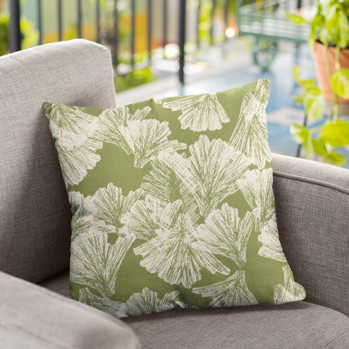 Aloe and Ivory Nahenahe Square Pillowcase Set On a Grey Fabric Chair