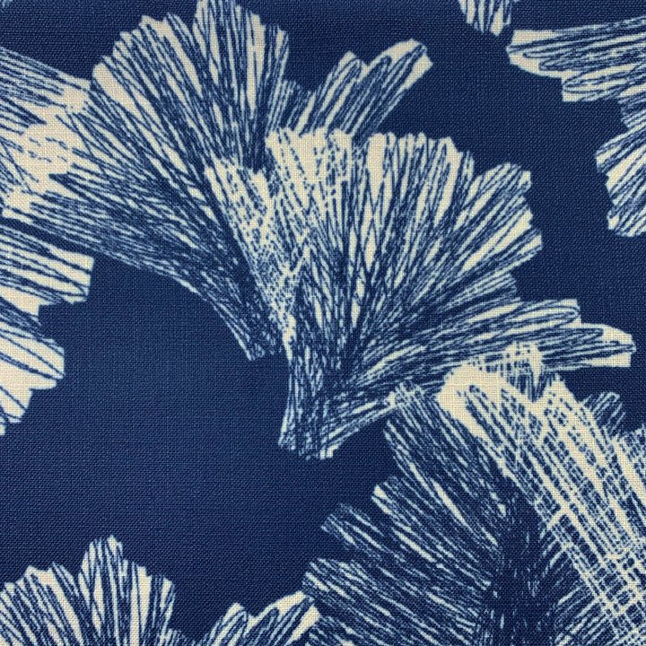 Closeup of the Ivory and Navy Nahenahe Square Pillowcase Hawaiian Print