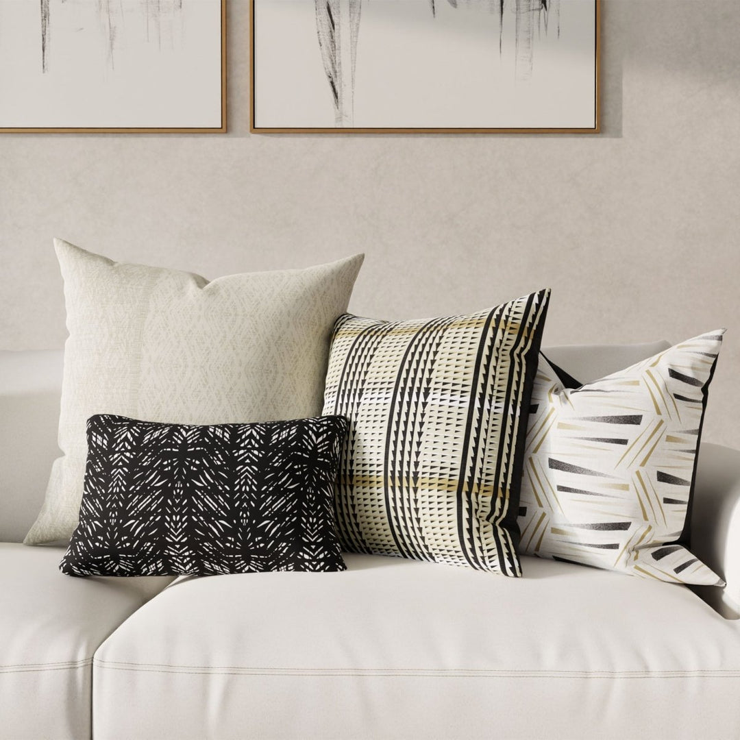 Ne'e Square Pillowcase Set On a Whote Fabric Couch with 2 Lumbar Pillows and One Square Pillow