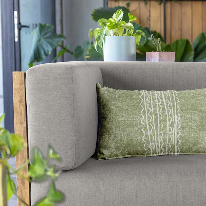 Aloe Niho Lumbar Pillowcase Set On a Grey Fabric Modern Sofa