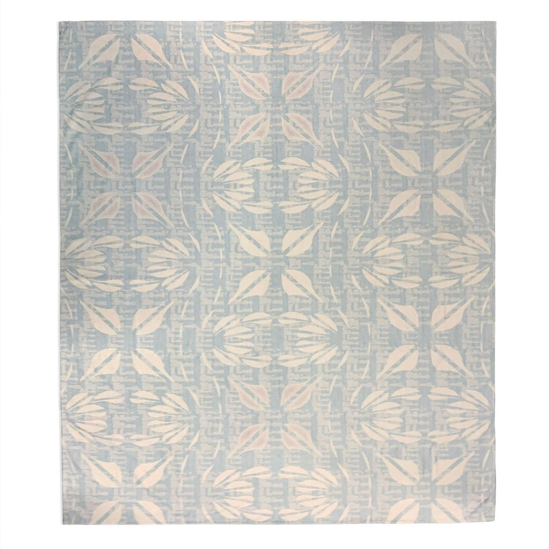 Pīʻāpā Luxury Throw in a Light Blue and Beige Color Scheme