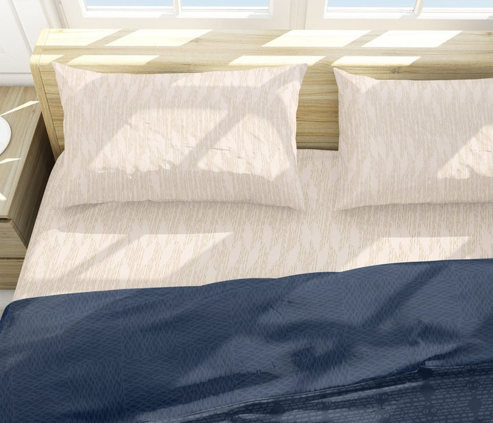 Pili Luxury Sheet Set On a Bed With Two Pillows